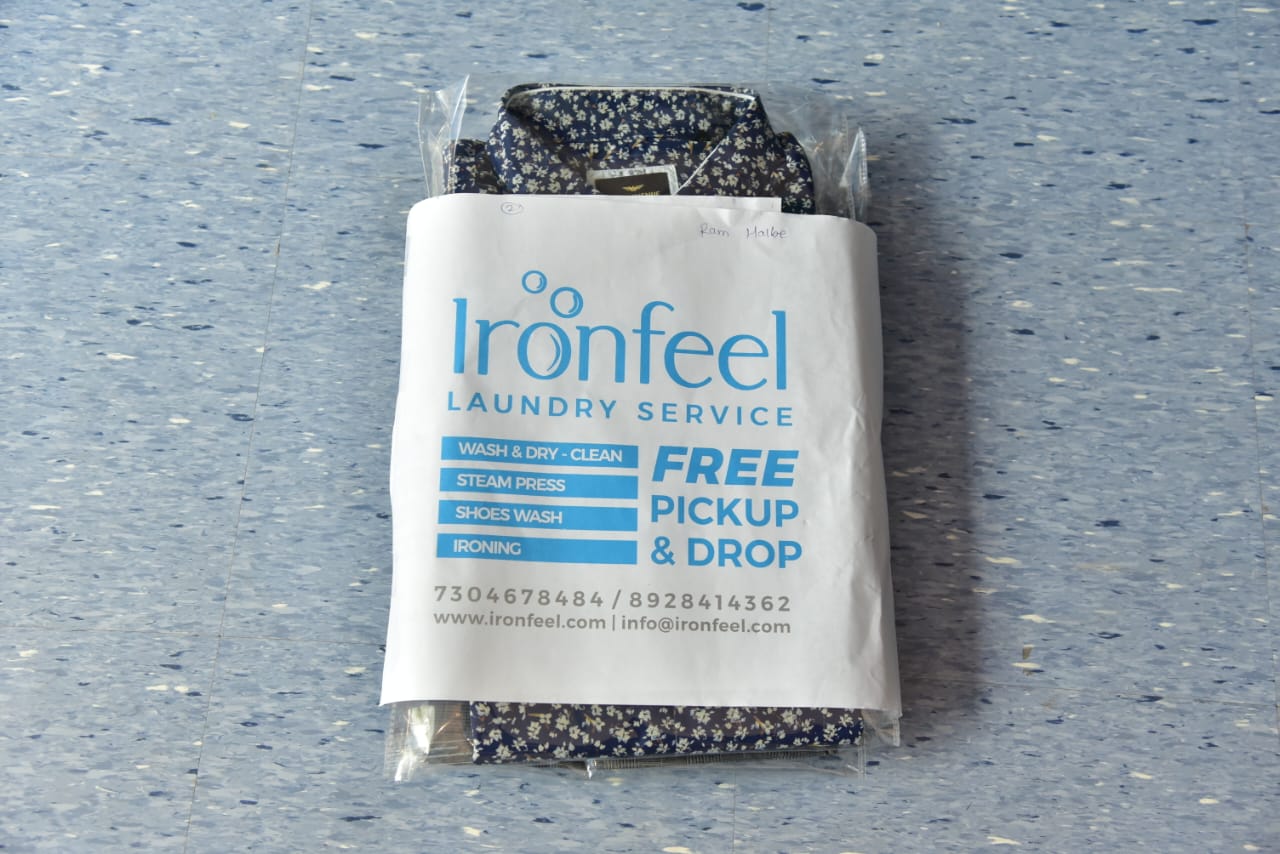 Shirt in IronFeel branded packaging with free pickup and drop