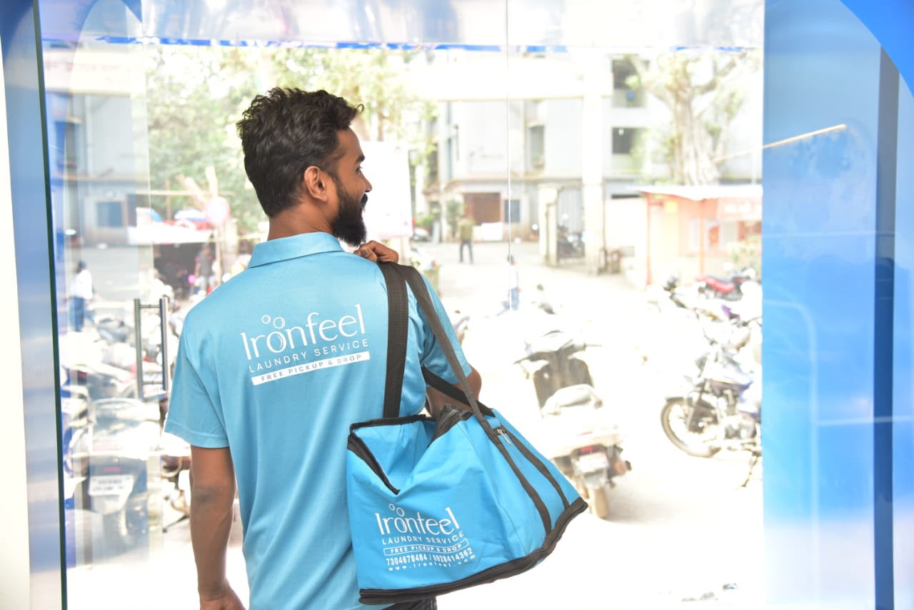 IronFeel staff carrying branded pickup bag